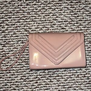 Nude pink clutch with wristlet Aldo